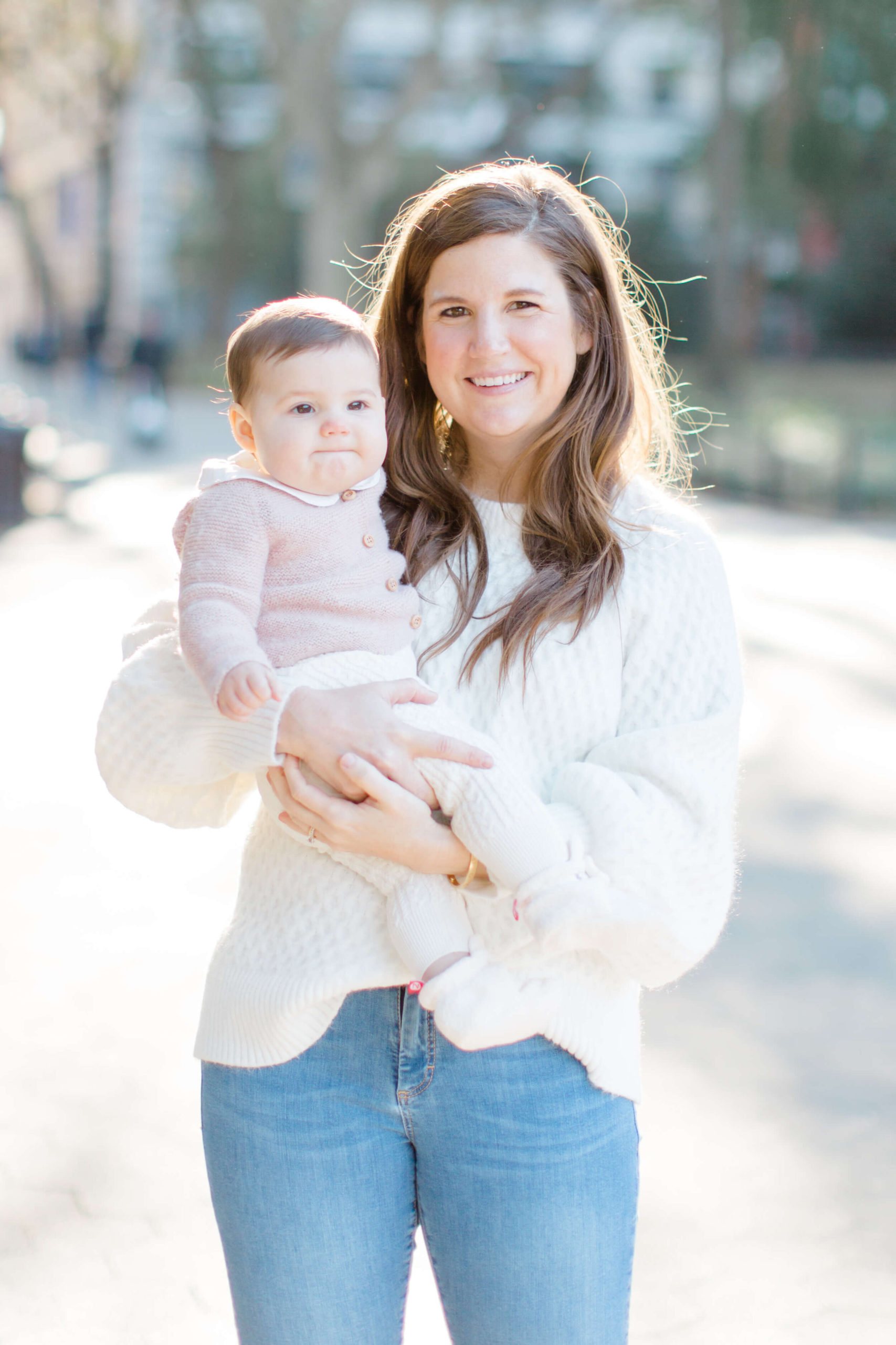 Family photography in Washington Square Park pictured by top NYC family photographer, Jacqueline Clair